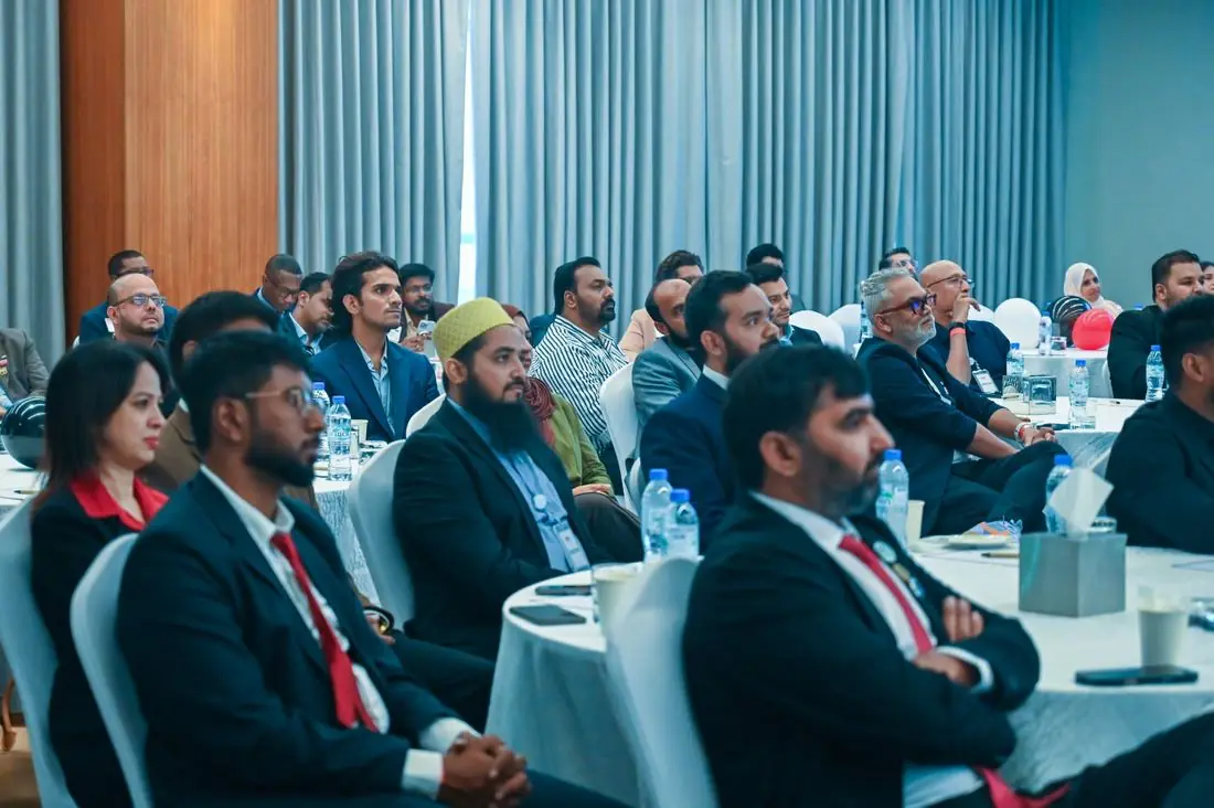 Members listen during the meeting